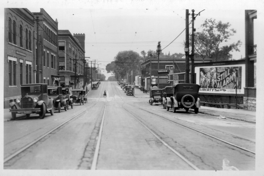 Photograph of city scene at 10th Street and Troost Avenue